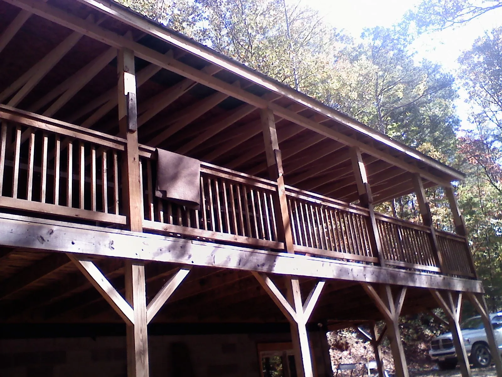 Timber framing under a new elevated porch and deck — Roof Leak Repair in Hazlet by Roofing Brothers